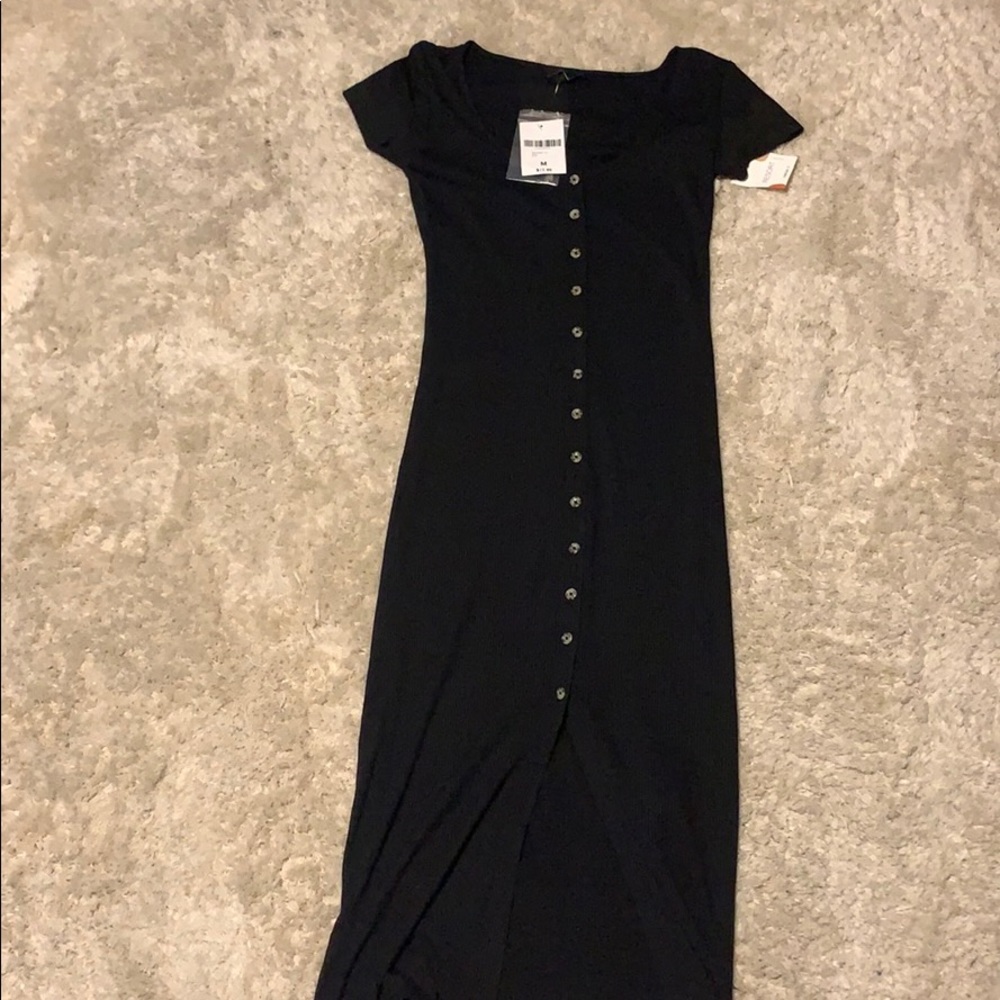 Black long dress with buttons and slit in front